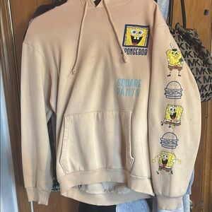 SpongeBob SquarePants Tan Sweater Vibrant Cartoon Graphics